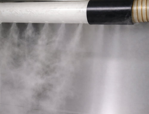 Airflow visualization using a perforated smoke manifold to distribute smoke evenly for evaluation of airflow uniformity